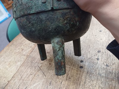 Lot 26 - A CHINESE ARCHAIC BRONZE RITUAL FOOD VESSEL, DING