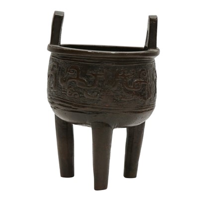Lot 523 - A small Chinese archaistic bronze tripod censer, Ming dynasty