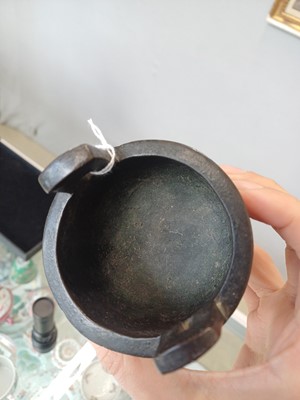 Lot 663 - A SMALL CHINESE ARCHAISTIC BRONZE TRIPOD CENSER