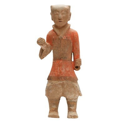 Lot 116 - A large Chinese painted pottery figure of a guard, Han dynasty