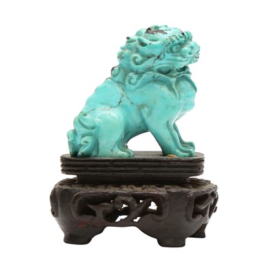 Lot 561 - A small Chinese carved turquoise 'lion dog' carving, Qing dynasty, 19th century