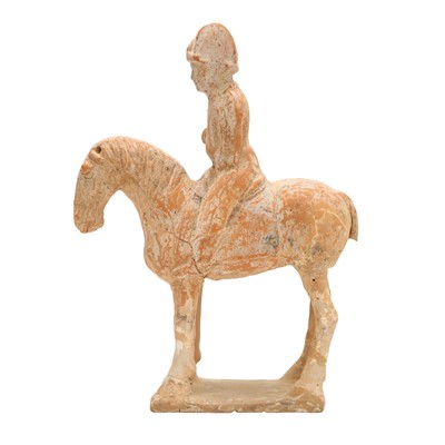 Lot 646 - A Chinese pottery figure of a horse and rider, Tang dynasty
