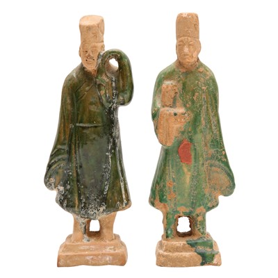 Lot 669 - Two Chinese pottery green-glazed figures, Ming dynasty