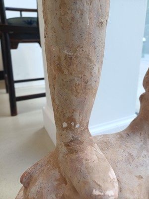 Lot 111 - A LARGE CHINESE POTTERY FIGURE OF LOKAPALA