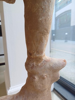 Lot 111 - A LARGE CHINESE POTTERY FIGURE OF LOKAPALA