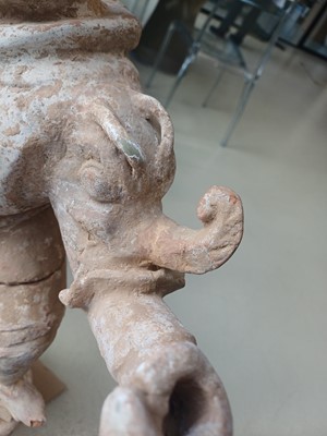 Lot 111 - A LARGE CHINESE POTTERY FIGURE OF LOKAPALA