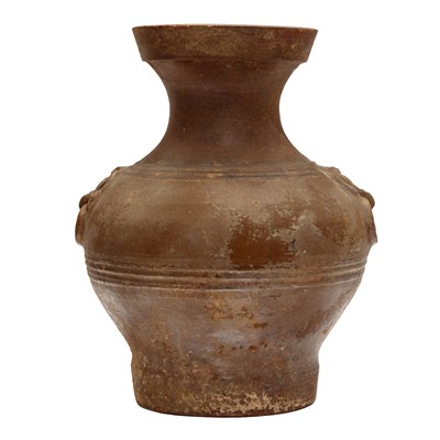 Lot 639 - A Chinese pottery brown-glazed vase, hu, Han dynasty