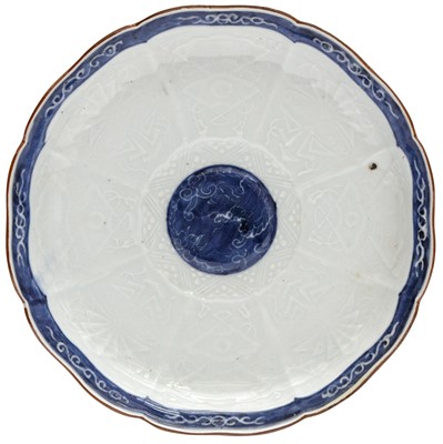 Lot 3 - A Japanese Arita blue and white moulded dish, Edo period, 17th-18th century
