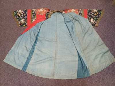 Lot 131 - A CHINESE MANCHU NOBLEWOMAN'S INFORMAL KESI SILK RED-GROUND ROBE, DANPAO