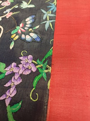 Lot 131 - A CHINESE MANCHU NOBLEWOMAN'S INFORMAL KESI SILK RED-GROUND ROBE, DANPAO