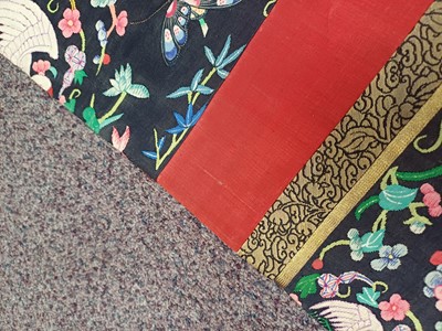 Lot 131 - A CHINESE MANCHU NOBLEWOMAN'S INFORMAL KESI SILK RED-GROUND ROBE, DANPAO