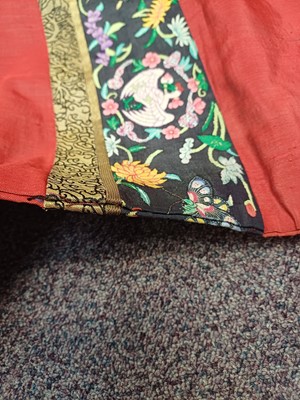Lot 131 - A CHINESE MANCHU NOBLEWOMAN'S INFORMAL KESI SILK RED-GROUND ROBE, DANPAO