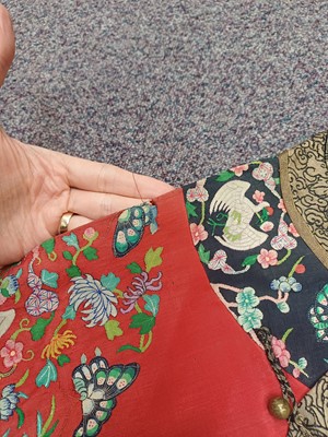 Lot 131 - A CHINESE MANCHU NOBLEWOMAN'S INFORMAL KESI SILK RED-GROUND ROBE, DANPAO