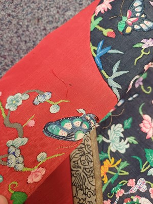 Lot 131 - A CHINESE MANCHU NOBLEWOMAN'S INFORMAL KESI SILK RED-GROUND ROBE, DANPAO