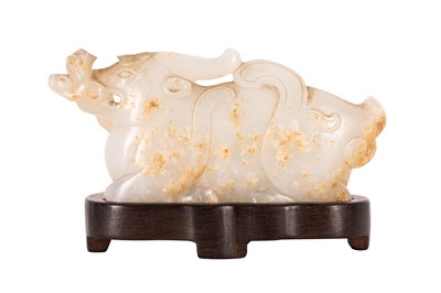 Lot 108 - A CHINESE PALE CELADON 'WATER BUFFALO' JADE CARVING