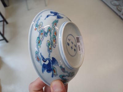 Lot 689 - A CHINESE DOUCAI 'DRAGON AND CRANES' DISH