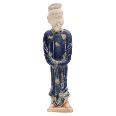 Lot 641 - A Chinese blue-glazed figure of an attendant, possibly Tang dynasty