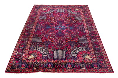 Lot 82 - AN ANTIQUE KIRMAN LAVER RUG, SOUTH PERSIA