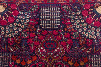Lot 82 - AN ANTIQUE KIRMAN LAVER RUG, SOUTH PERSIA