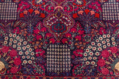 Lot 82 - AN ANTIQUE KIRMAN LAVER RUG, SOUTH PERSIA