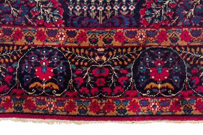 Lot 82 - AN ANTIQUE KIRMAN LAVER RUG, SOUTH PERSIA