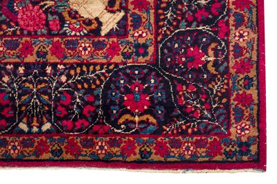 Lot 82 - AN ANTIQUE KIRMAN LAVER RUG, SOUTH PERSIA