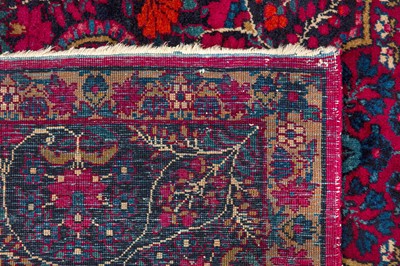 Lot 82 - AN ANTIQUE KIRMAN LAVER RUG, SOUTH PERSIA