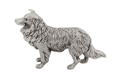 Lot 127 - A VICTORIAN STERLING SILVER MODEL OF A DOG, LONDON 1899 BY SAMPSON MORDAN AND CO