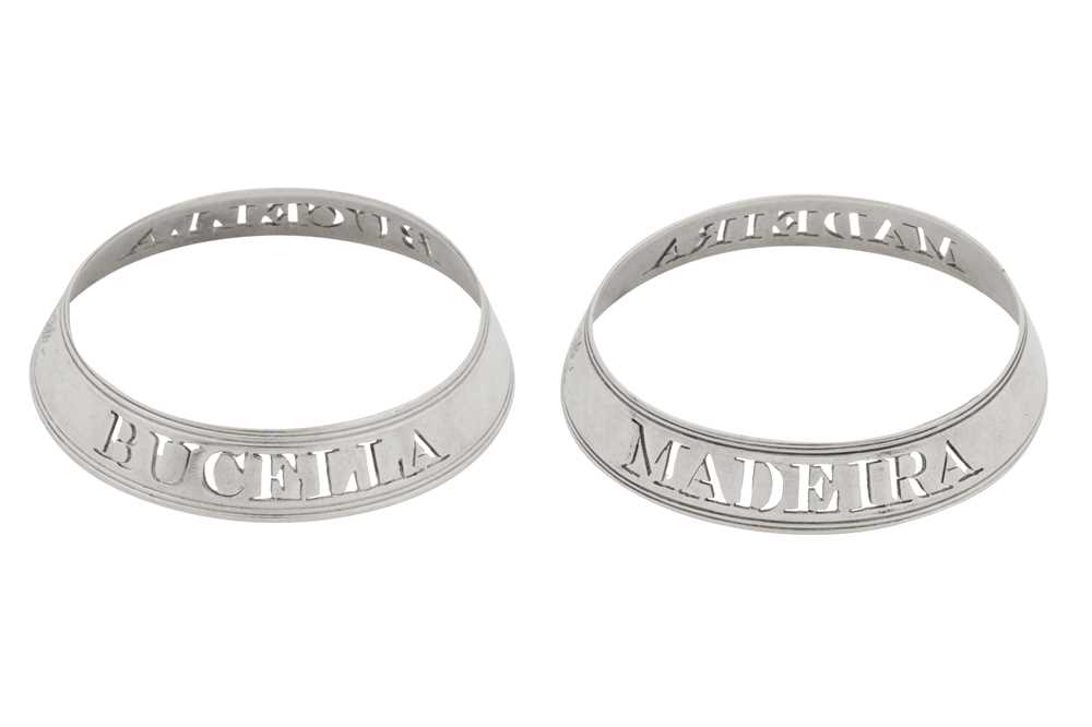 Lot 32 - A pair of George III sterling silver wine label bottle collars, London 1799 by Thomas Phipps and Edward Robinson