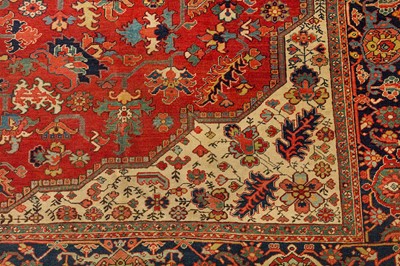 Lot 32 - AN ANTIQUE HERIZ CARPET, NORTH-WEST PERSIA