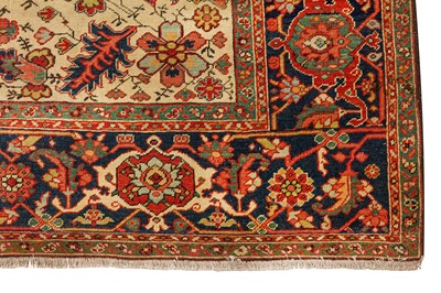 Lot 32 - AN ANTIQUE HERIZ CARPET, NORTH-WEST PERSIA