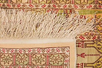 Lot 74 - AN EXTREMELY FINE SIGNED SILK HEREKE RUG, TURKEY
