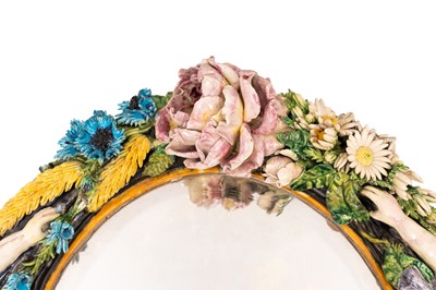 Lot 87 - A Continental majolica oval wall mirror, late 19th / early 20th century