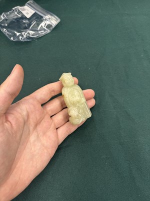 Lot 80 - A CHINESE JADE 'HUREN' CARVED FIGURE