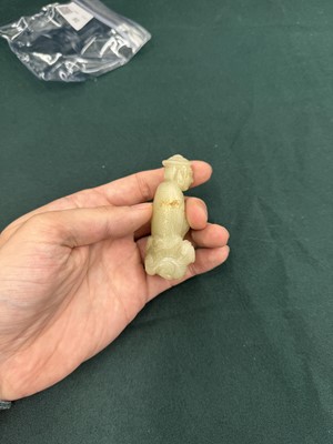 Lot 80 - A CHINESE JADE 'HUREN' CARVED FIGURE