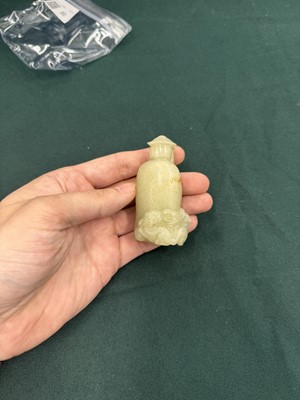 Lot 80 - A CHINESE JADE 'HUREN' CARVED FIGURE