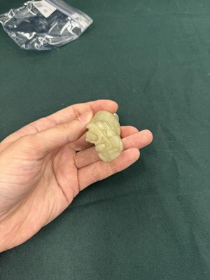 Lot 80 - A CHINESE JADE 'HUREN' CARVED FIGURE