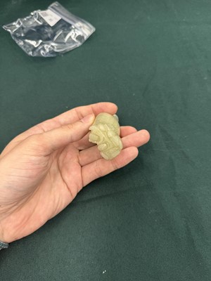Lot 80 - A CHINESE JADE 'HUREN' CARVED FIGURE