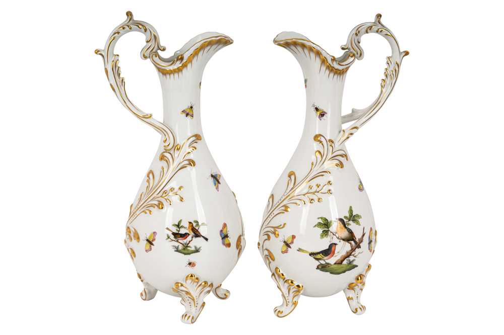 Lot 168 - A pair of Herend 'Rothschild bird' porcelain ewers
