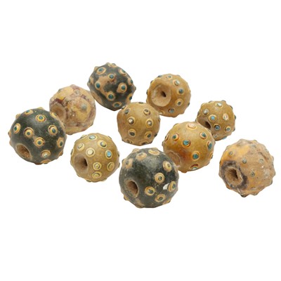 Lot 631 - A group of ten Chinese glass 'eye' beads, Eastern Zhou - Han dynasty