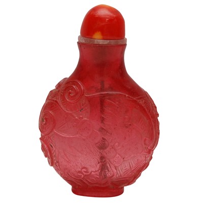 Lot 731 - A Chinese pink glass 'butterfly' snuff bottle, 18th - 19th century