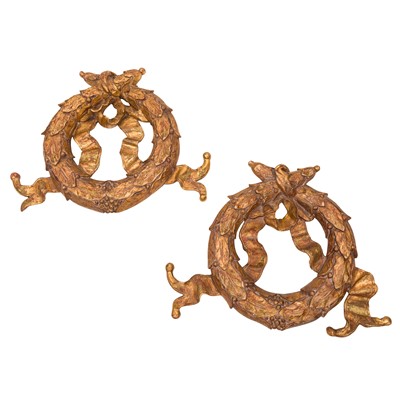 Lot 173 - A Pair of Italian giltwood laurel wreath and ribbon wall appliques