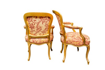 Lot 53 - A near pair of Louis XV style giltwood fauteuils, mid to late 19th century