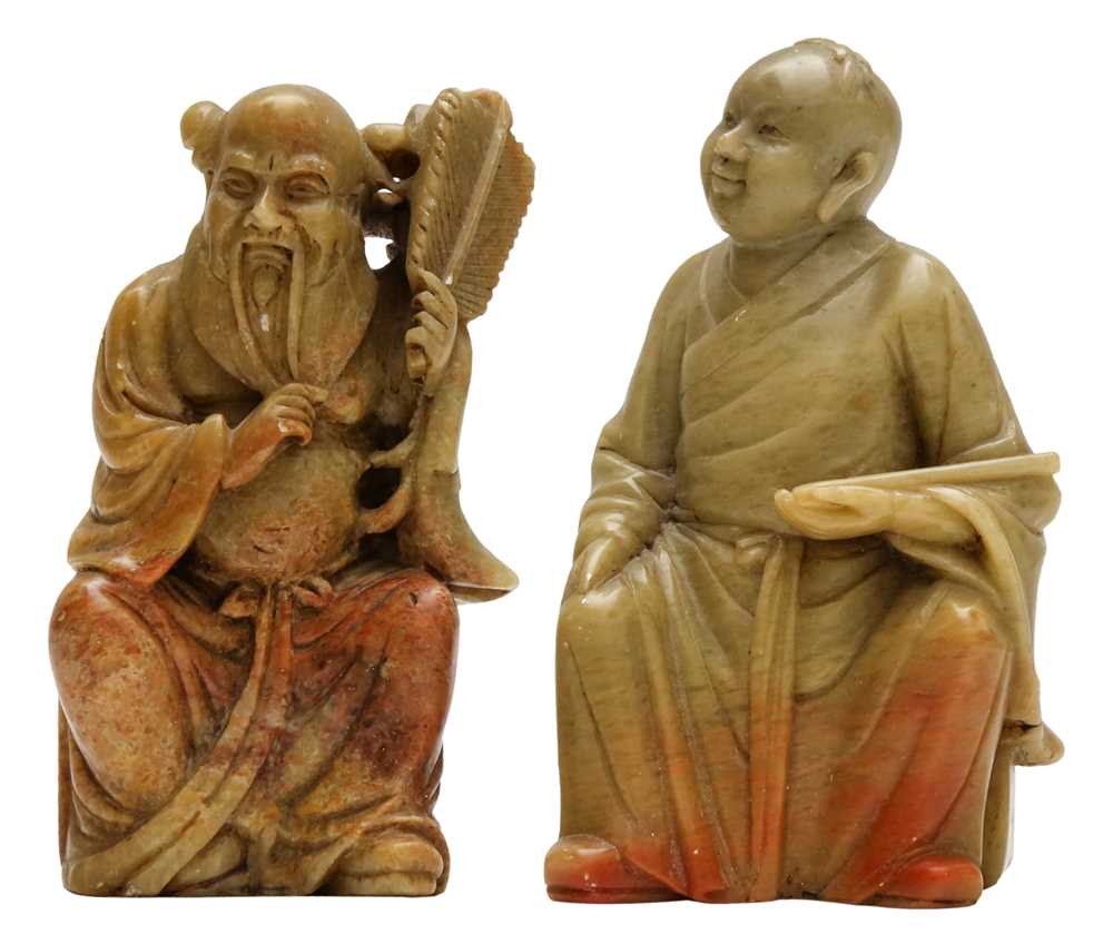 Lot 643 - A PAIR OF CHINESE CARVED SOAPSTONE DAOIST FIGURES