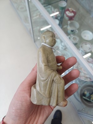 Lot 643 - A PAIR OF CHINESE CARVED SOAPSTONE DAOIST FIGURES