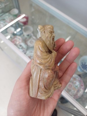 Lot 643 - A PAIR OF CHINESE CARVED SOAPSTONE DAOIST FIGURES