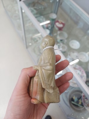 Lot 643 - A PAIR OF CHINESE CARVED SOAPSTONE DAOIST FIGURES