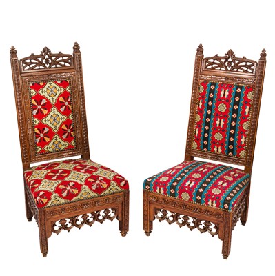 Lot 319 - A near pair of Victorian reformed Gothic walnut side chairs