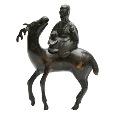 Lot 529 - A Chinese bronze 'immortal riding deer' censer, Qing dynasty, 17th / 18th century