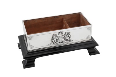 Lot 70 - An Edwardian sterling silver presentation cigar or cigarette casket, London 1903 by James Dixon and Sons